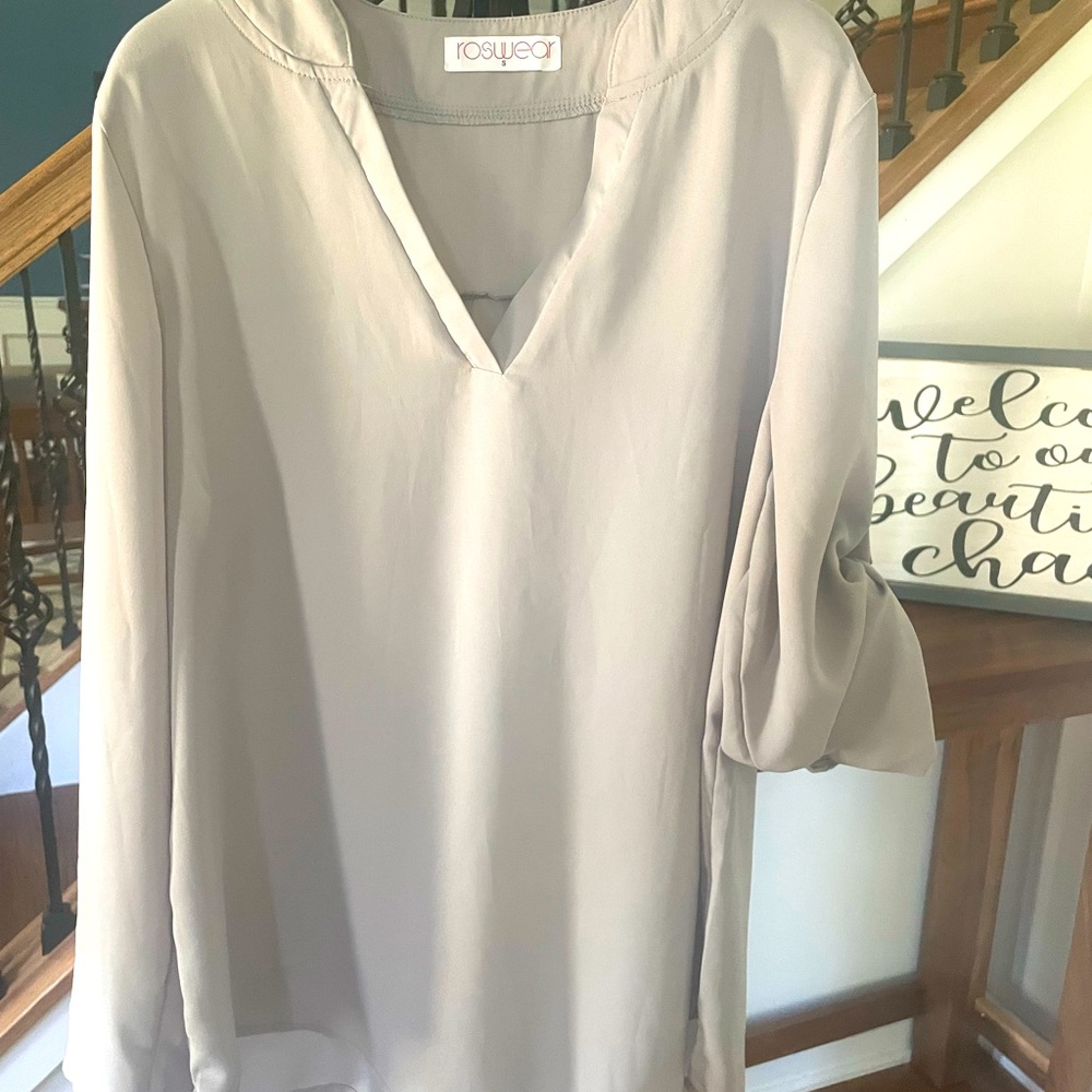 Light weight grey top. Size small. Sleeves roll up with silver buckle